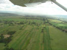 Taking off from Nakuru Lanet airfield, see the lake on the left side, the town on the right.
