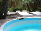 The staggered swimming pools of the Oasis Lodge