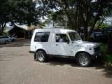 Our white Suzuki Maruti Gypsy in front of the Aero Club of East Africa
