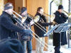 The trombone players